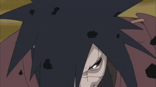a close up of a person 's eyes with a red pupil