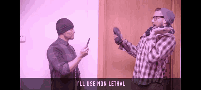 two men standing next to each other with the words i 'll use non lethal written below them