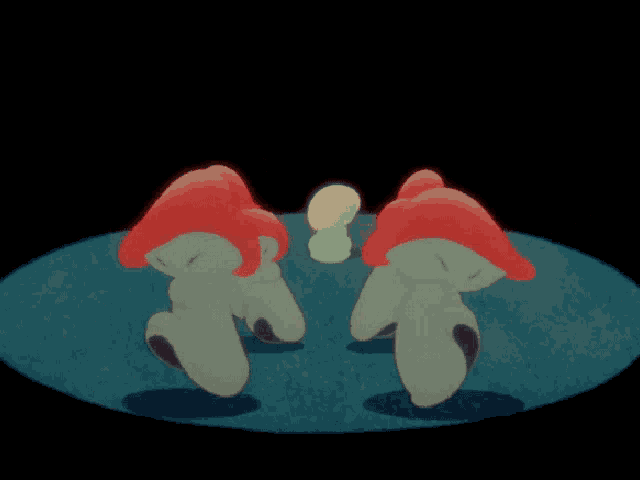 a group of red and white mushrooms are standing in a circle on a blue surface