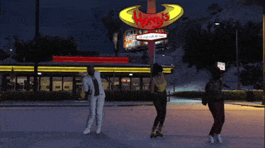 a group of people dancing in front of a horny 's diner