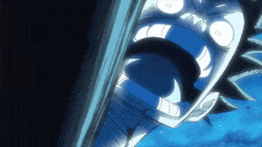 a close up of a person 's face with their mouth wide open