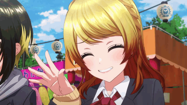 a girl in a school uniform is smiling and giving the peace sign