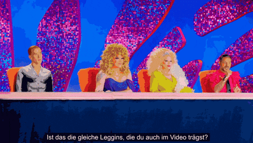 a group of drag queens are sitting at a table with the words ist das die gleiche leggins die du auch im video tragst