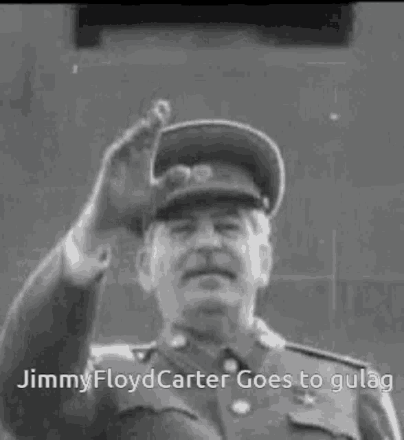 a black and white photo of a man in a military uniform with the caption jimmy floyd carter goes to gulag .