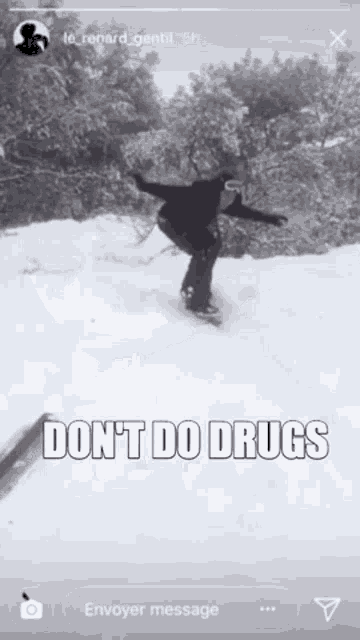 a person riding a snowboard in the snow with the words " do n't do drugs " on the bottom