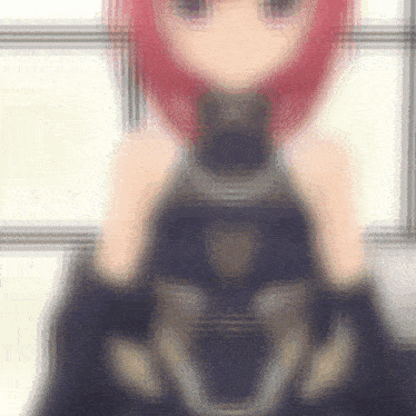 a blurry picture of a red haired anime girl