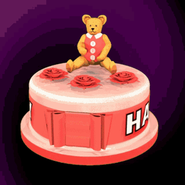 a teddy bear sitting on top of a cake that says ha