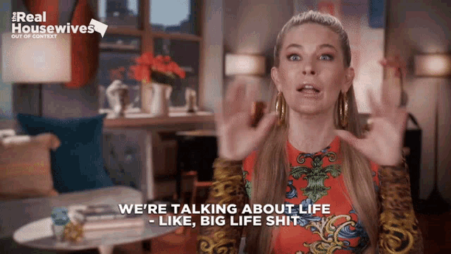 a woman says we 're talking about life like big life shit in a living room