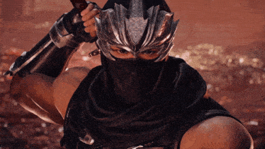a man in a ninja costume holds a sword