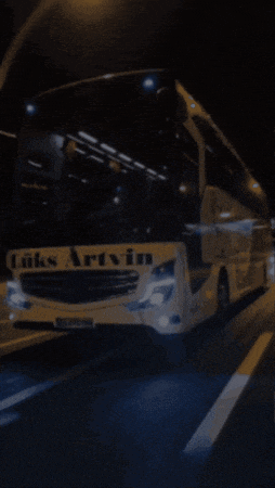 a double decker bus that says artvin on the front