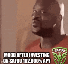 a man with a beard is wearing a red shirt and has a badge on his chest that says safuu .