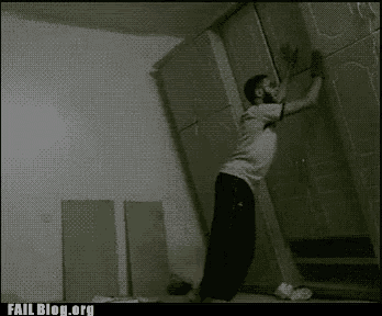 a man is doing a trick on a wall with a fail blog.org watermark on the bottom of the image .