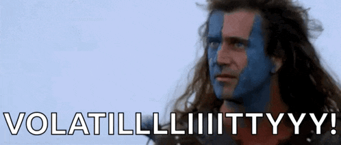 a man with blue paint on his face says " volatillliiiittyyyy "
