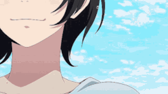 a close up of a girl with short black hair and a blue sky in the background .
