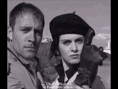 a man and a woman are standing next to each other in a black and white photo with the words no perditempo forum above them
