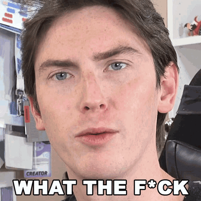 a close up of a man 's face with the words " what the f * ck " above it