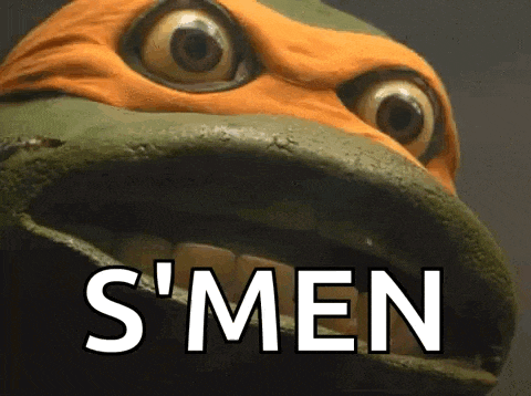 a close up of a teenage mutant ninja turtle 's face with the words `` s 'men '' written above it .