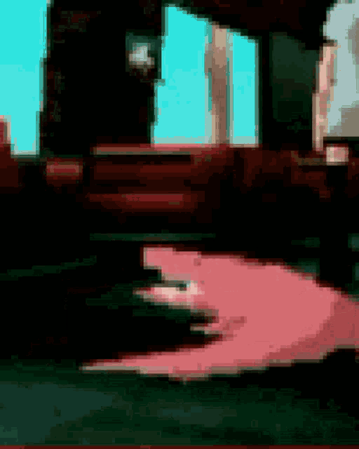 a pixelated image of a person standing in front of a window .