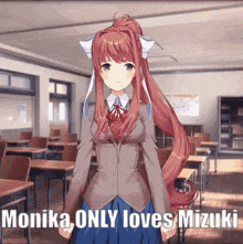 a girl with long red hair is standing in a classroom with a caption that says `` monika only loves mizuki '' .