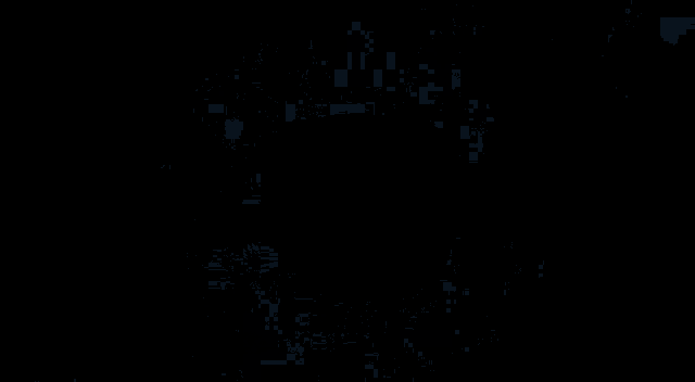 a blue and white explosion in the middle of a black background