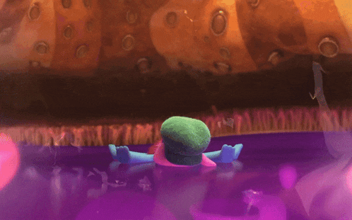 a cartoon character with a green hat is laying in a pool of purple liquid