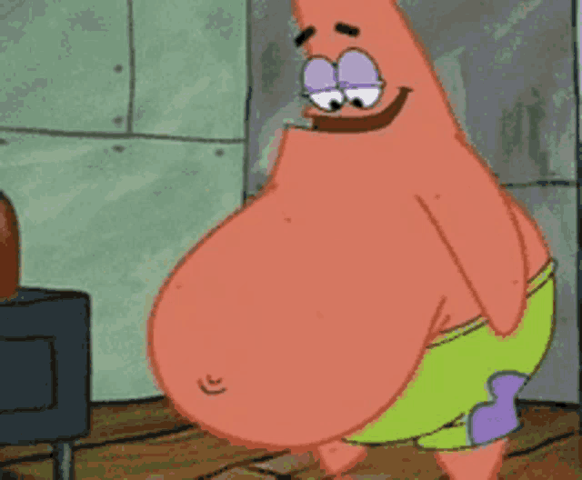 patrick star from spongebob squarepants has a big belly and is smiling