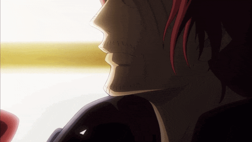 a close up of a man 's face with red hair against a white background