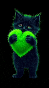 a black kitten is holding a neon green heart in its paws .