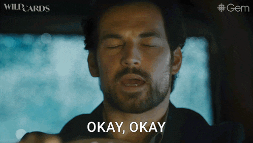 a man with a beard says okay okay