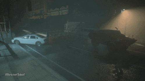 a white car is parked on the side of the road next to a black car and a sign that says illusive soul