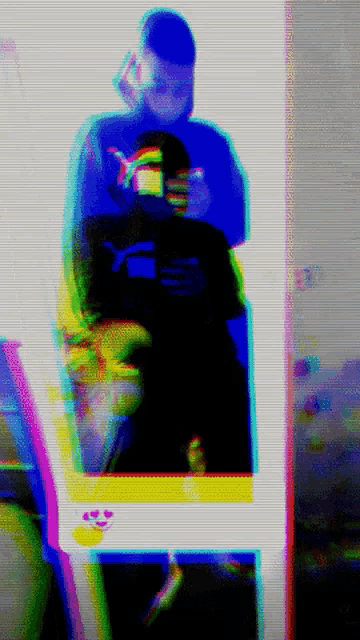 a blurry image of a man taking a selfie