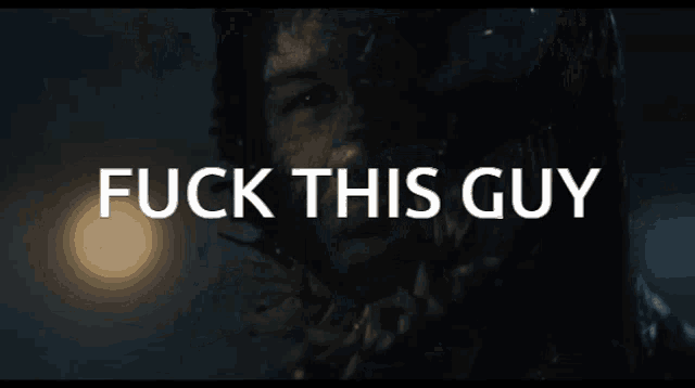 a venom poster that says " fuck this guy " on it