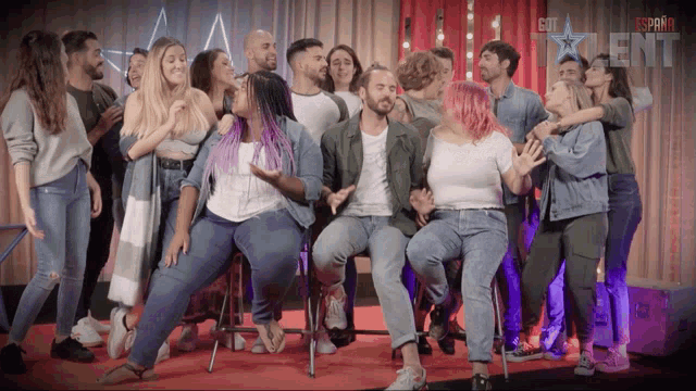 a group of people are posing for a picture with the word talent on the bottom