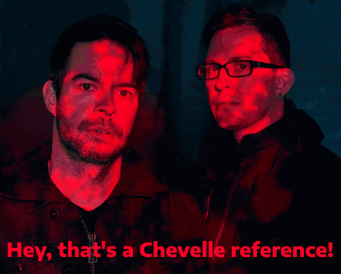 a man playing drums with the words " hey that 's a chevelle reference " below him