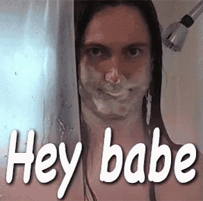 a woman taking a shower with the words hey babe on the bottom right