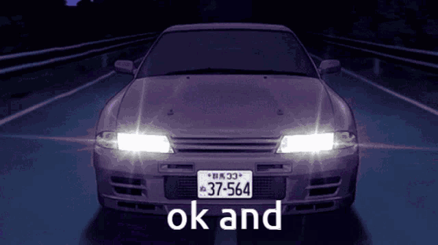 a car with the license plate 37-564 is driving down the road