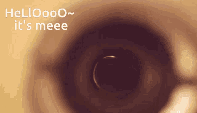 a close up of a cup of coffee with the words hellooo it 's meee