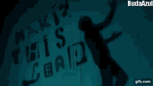 a shadow of a person standing in front of a sign that says make this lead .
