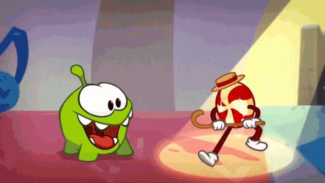 a cartoon character is holding a cane next to a candy character