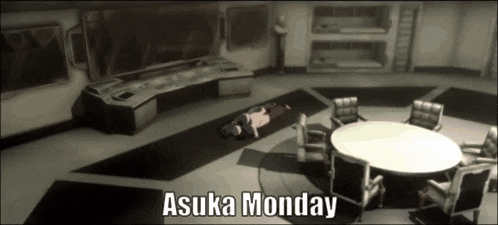a person laying on the floor in a room with the words asuka monday