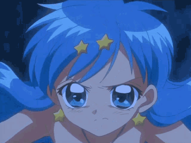 a girl with blue hair and gold stars on her head winks