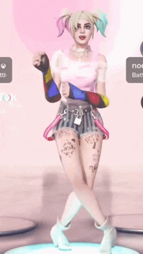 a woman in a harley quinn costume is dancing