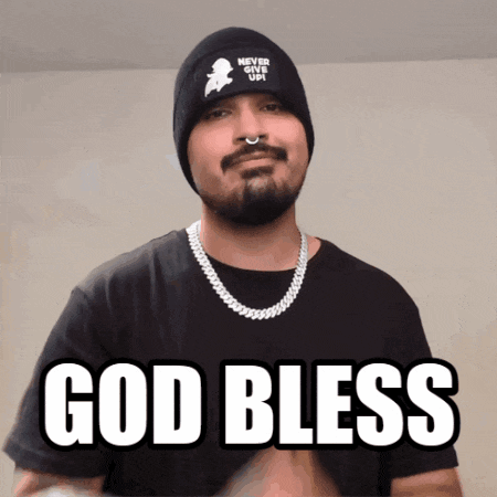 a man with a beard wearing a beanie and a necklace says god bless