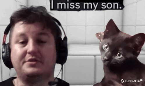 a man wearing headphones stands next to a cat with the words " i miss my son " behind him