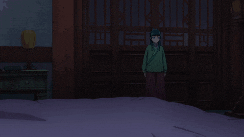 a girl with blue hair is laying down and looking up