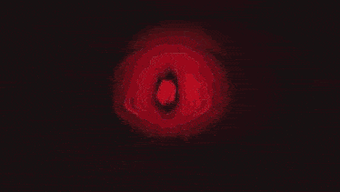 a red and black painting with the letter a in the middle