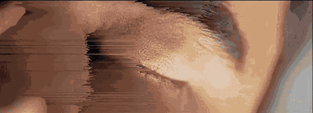 a close up of a person 's eye with a few lines coming out of it