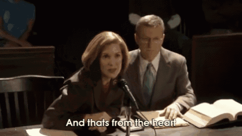 a man and a woman are sitting at a table in front of microphones with the words and thats from the heart behind them
