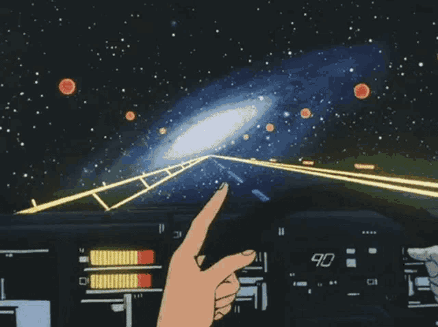 a person 's hand is pointing at a galaxy with the number 90 on the dashboard