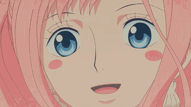 a girl with pink hair and blue eyes looks at the camera